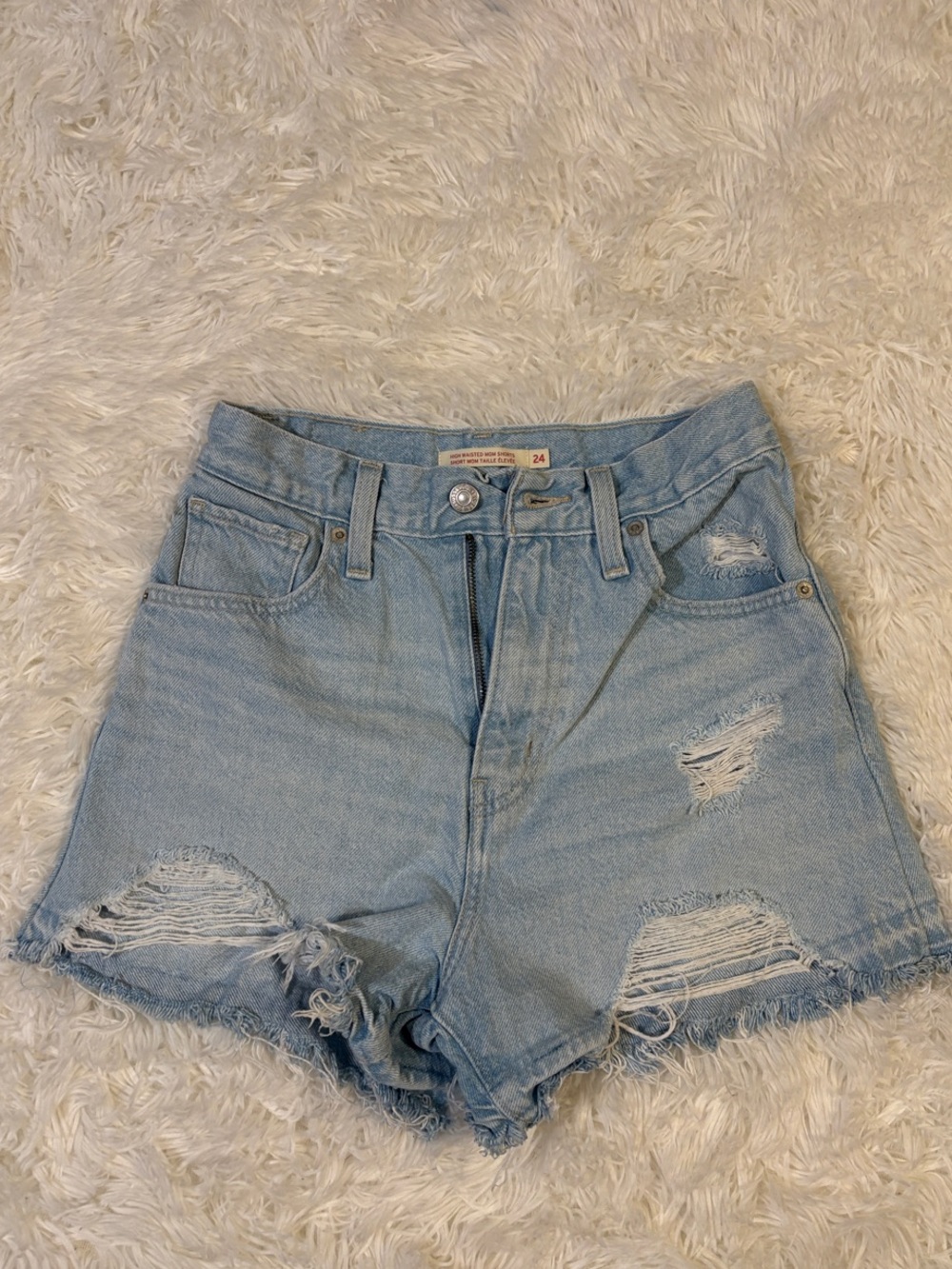 Levi’s Light Blue Distressed High-Waisted Mom Shorts